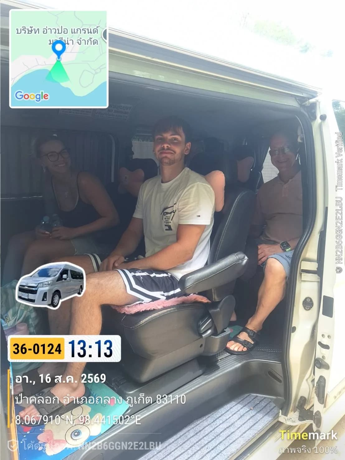 Guests relaxing on board a private van transfer through Phuket on the way to Khao Lak