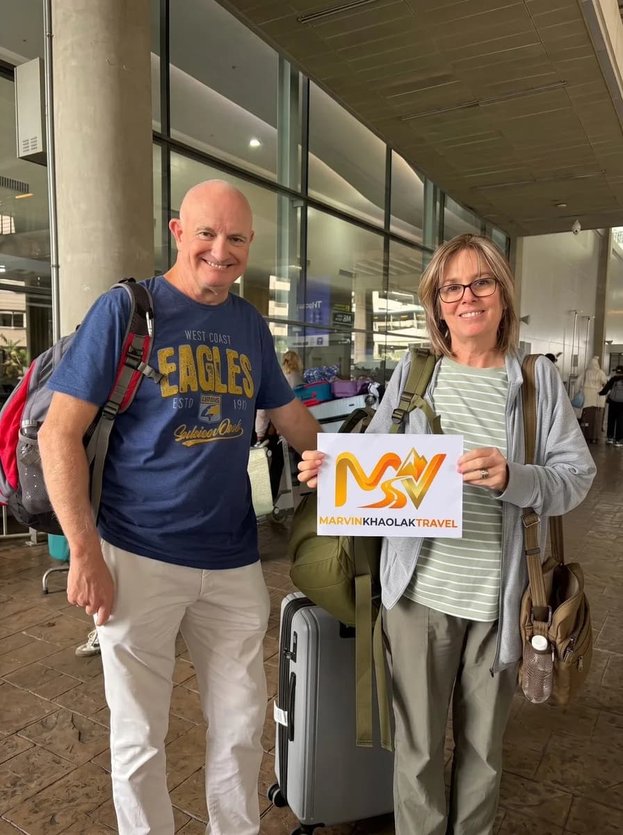 Couple met at Phuket Airport arrivals for their private transfer to Khao Lak